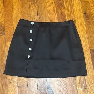 Brand new black silk material skirt